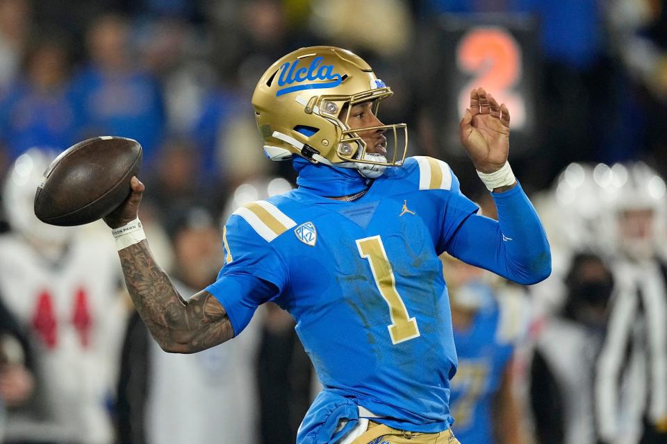 UCLA quarterback Dorian Thompson-Robinson passes during the first half of an NCAA college football game against Arizona on Saturday, Nov. 12, 2022, in Pasadena, California.