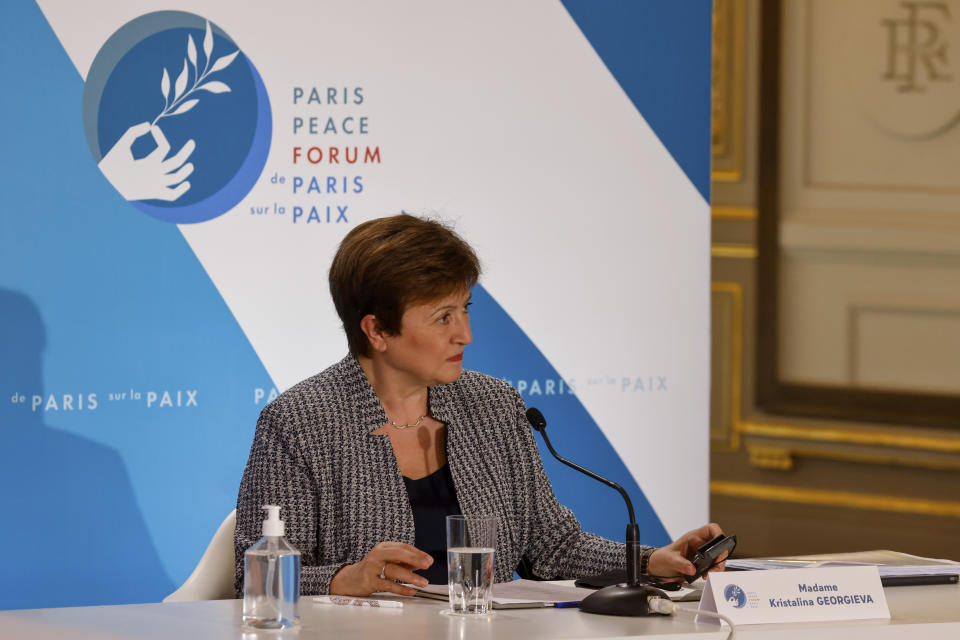 FILE - In this Nov. 12, 2020 file photo, International Monetary Fund Managing Director Kristalina Georgieva attends the Paris Peace Forum at The Elysee Palace in Paris. Georgieva said Tuesday, March 30, 2021, that when the IMF releases its updated economic forecast next week, it will show the global economy growing at a faster pace than the 5.5% gain it projected at the start of the year. (Ludovic Marin, Pool via AP)