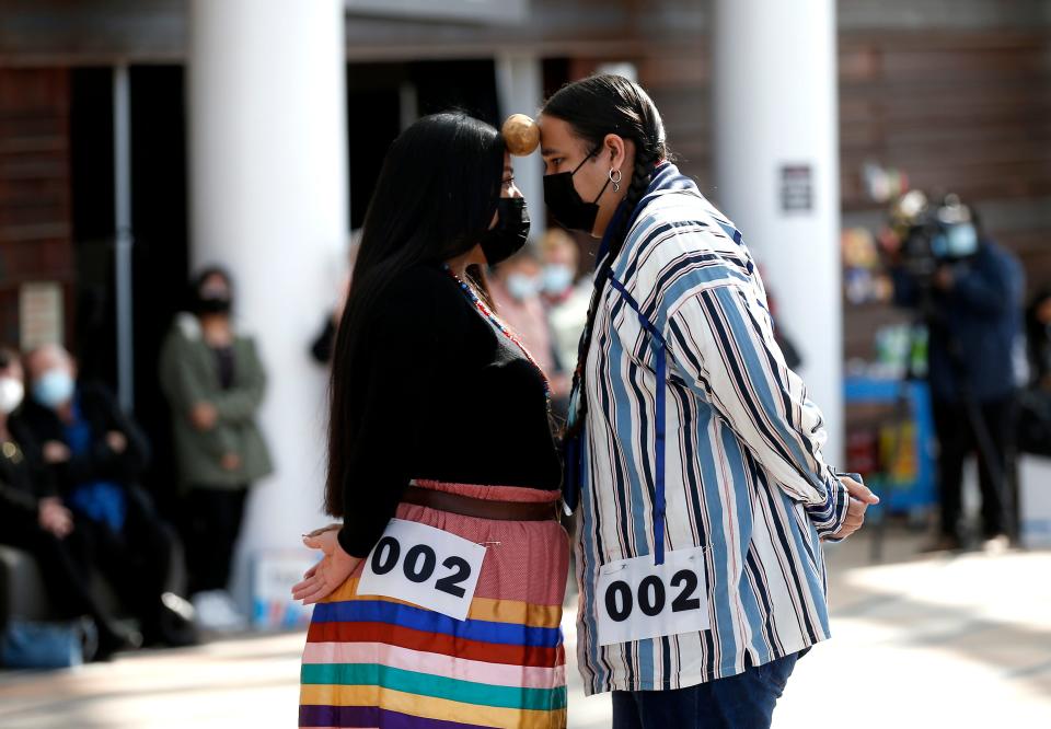 A pair of dancers move together during the Potato Dance World Championships on Saturday at the First Americans Museum in Oklahoma City.