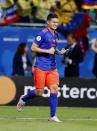 Colombia's James Rodriguez celebrates the second goal scored by Colombia's Duvan Zapata during a Copa America Group B soccer match against Argentina at the Arena Fonte Nova in Salvador, Brazil, Saturday, June 15, 2019. (AP Photo/Natacha Pisarenko)