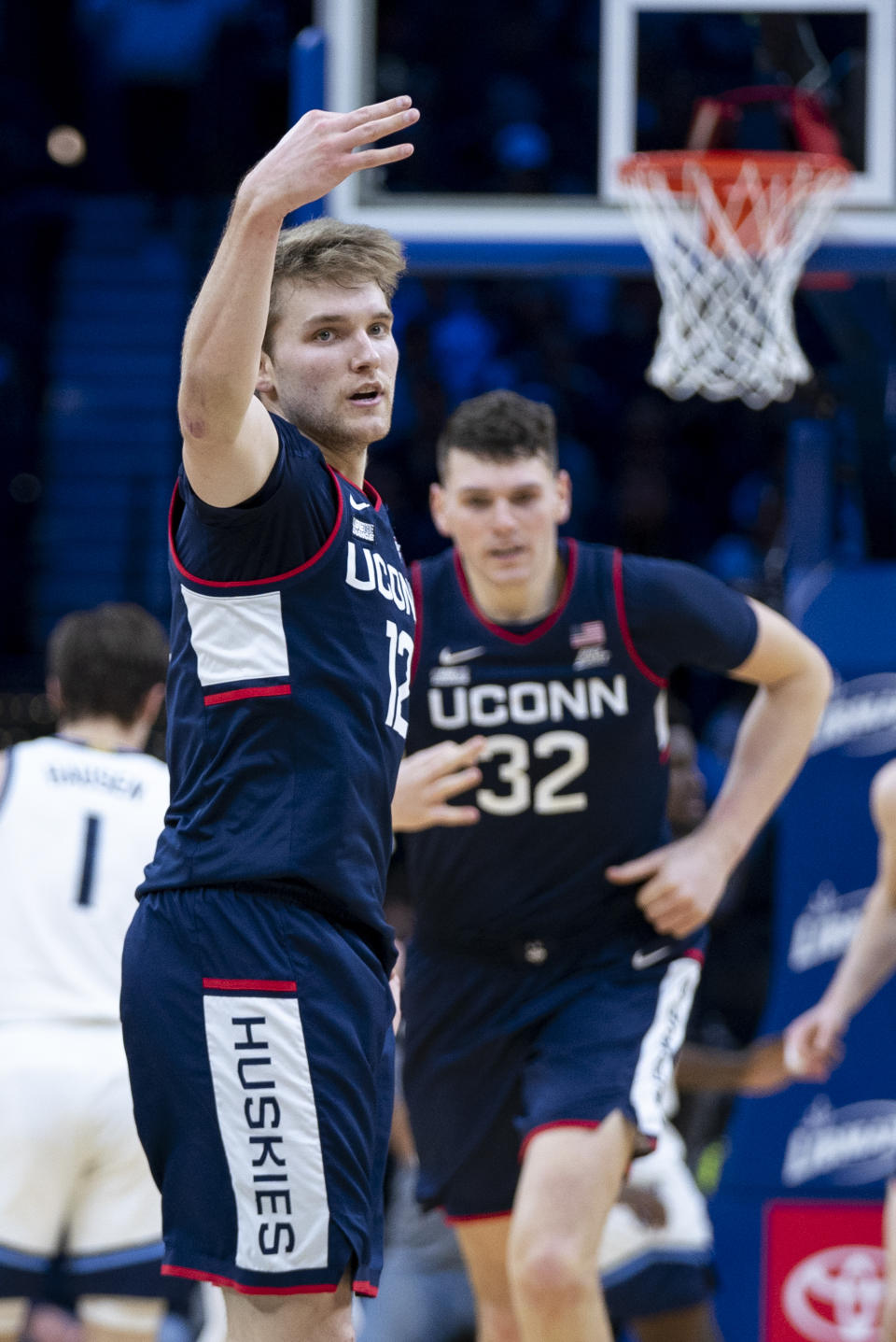 UConn's Cam Spencer reacts to his 3-point shot during the first half of the team's NCAA college basketball game against Villanova on Saturday, Jan. 20, 2024, in Philadelphia. (AP Photo/Chris Szagola)