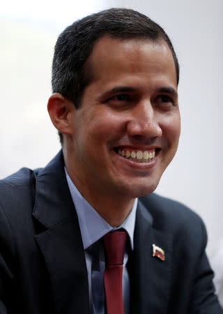 Venezuelan opposition leader Juan Guaido attends a meeting with representatives of FEDEAGRO, the Confederation of Associations of Agricultural Producers of Venezuela, in Caracas, Venezuela February 6, 2019. REUTERS/Carlos Garcia Rawlins