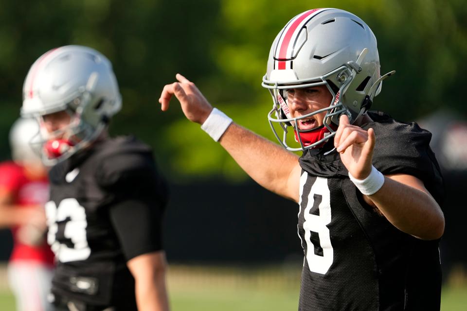 Aug 8, 2024; Columbus, Ohio, USA; Ohio State Buckeyes quarterback Will Howard (18) calls out a play during football practice at the Woody Hayes Athletic Complex.