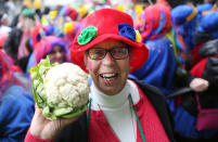 <p>A carnival reveller holds a cauliflower as she celebrates the start of the hot season on Women’s Carnival, Feb. 23, 2017, in Duesseldorf, western Germany. (Photo: Ina Fassbender/AFP/Getty Images) </p>