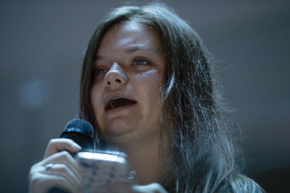 Kaileigh Murphy, 21, a senior at the College of New Jersey asks Education Secretary Betsy DeVos a question during a student town hall at National Constitution Center in Philadelphia, Monday, Sept. 17, 2018. (AP Photo/Matt Rourke)