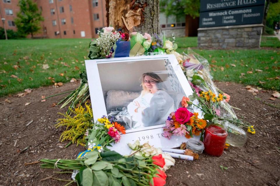 A photograph of Lovisa Arnesson-Cronhamre, 25, of Sweden, surrounded by flowers near the spot on Park Avenue where she was hit by a car driven by Ahmed Alqubaisi. Abby Drey/adrey@centredaily.com