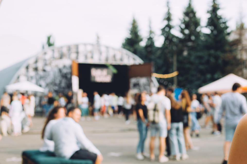 blurry photo of people at a festival