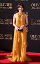 <p>Ophelia dazzled in a mustard-hued chiffon gown by Jenny Packham.<br><i>[Photo: Getty]</i> </p>