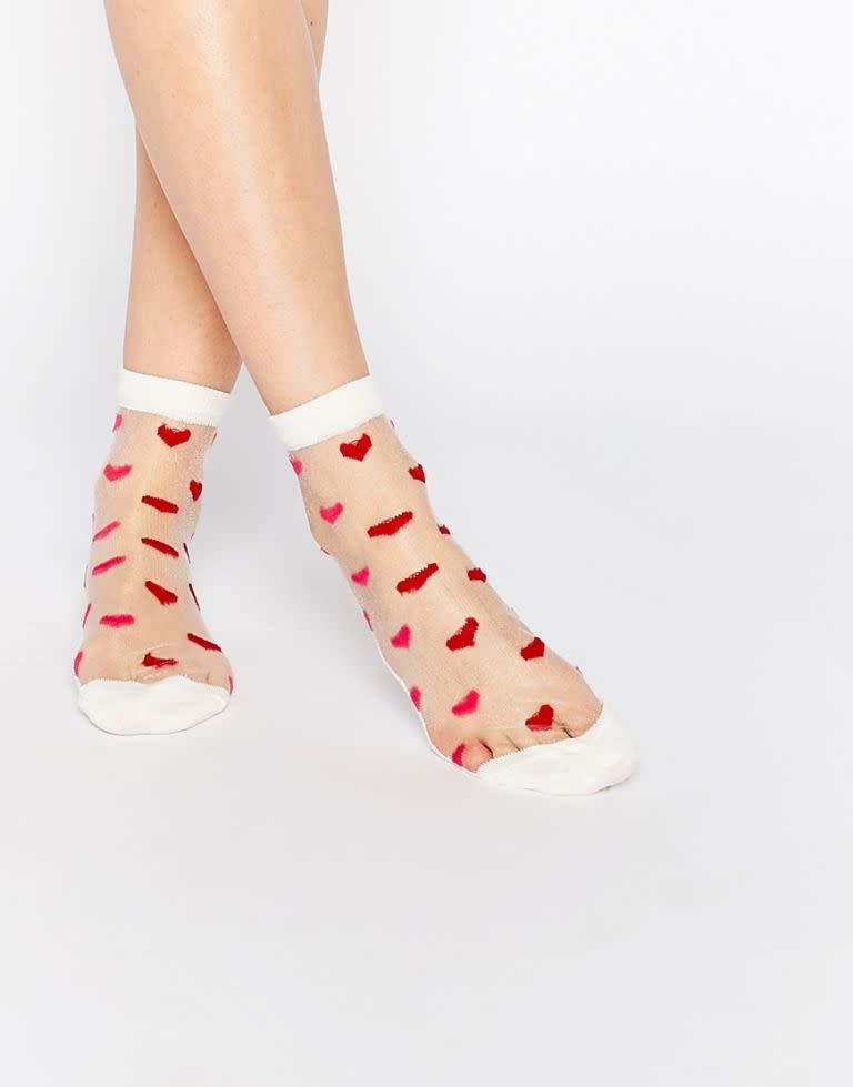 <p><a rel="nofollow noopener" href="http://www.asos.com/asos/asos-valentines-sheer-heart-ankle-socks/prod/pgeproduct.aspx?iid=6048716&clr=White&SearchQuery=heart&pgesize=36&pge=0&totalstyles=219&gridsize=3&gridrow=2&gridcolumn=2" target="_blank" data-ylk="slk:Sheer Heart Ankle Socks;elm:context_link;itc:0;sec:content-canvas" class="link "><i>Sheer Heart Ankle Socks</i></a><i>, ASOS, $5</i></p>