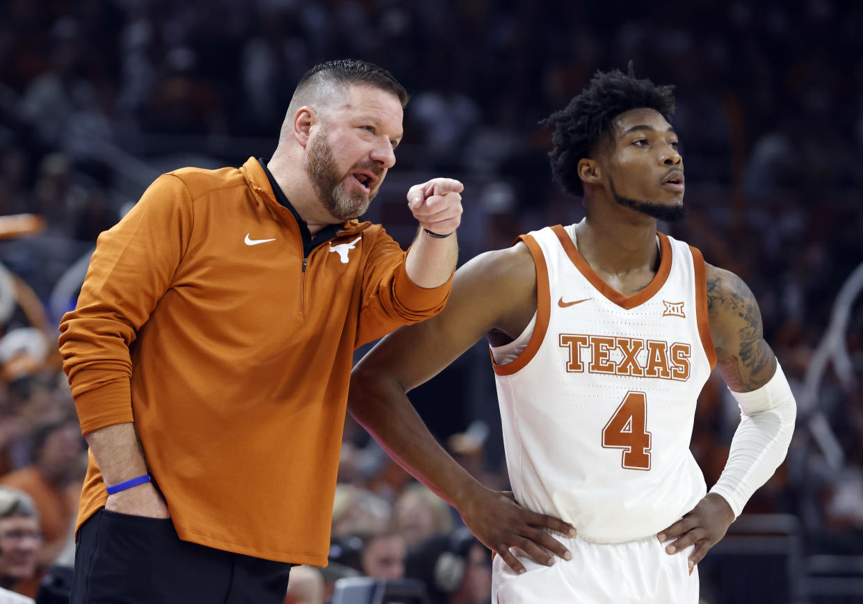 AUSTIN, TX - NOVEMBER 16: Texas head coach Chris Beard talks with Texas guard Tyrese Hunter (4) during game against the Gonzaga Bulldogs at the Moody Center in Austin, TX on November 16, 2022. (Photo by Adam Davis/Icon Sportswire via Getty Images