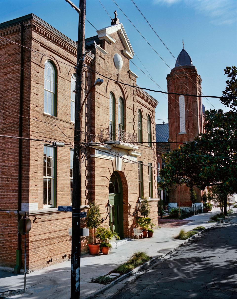 The 1860s schoolhouse exterior serves as the entrance to Hôtel Peter & Paul.