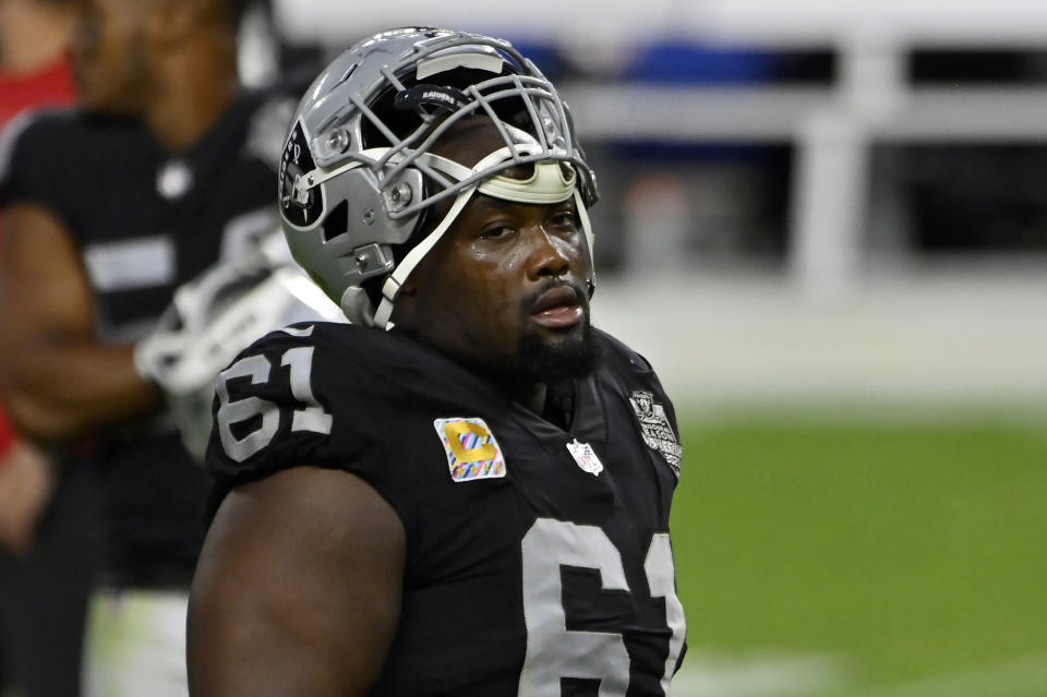 FILE - Las Vegas Raiders center Rodney Hudson (61) walks off the field after an NFL football game against the Tampa Bay Buccaneers in Las Vegas, in this Sunday, Oct. 25, 2020, file photo. The Raiders are planning to release star center Rodney Hudson as part of a major overhaul of the team's offensive line. A person familiar with the move said Tuesday, March 16, 2021, that Hudson will be released with two years left on his current contract. The person spoke on condition of anonymity because the move hadn't been announced. (AP Photo/David Becker, File)