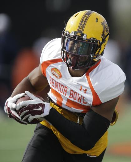 Minnesota running back David Cobb (37) runs the ball during NCAA college football practice for the Senior Bowl, Thursday, Jan. 22, 2015, at Ladd-Peebles Stadium in Mobile, Ala. (AP Photo/Brynn Anderson)