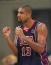 ATHENS - AUGUST 26: Tim Duncan #13 of United States celebrates defeating Spain in the men's basketball quarterfinal game on August 26, 2004 during the Athens 2004 Summer Olympic Games at the Indoor Hall of the Olympic Sports Complex in Athens, Greece. USA won 102-94 to advance to the semifinals. (Photo by Ezra Shaw/Getty Images)