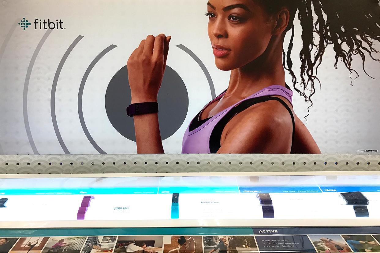 Fitbit fitness trackers are displayed on a shelf at a Target store on January 30, 2017 in Los Angeles, California: Justin Sullivan/Getty Images