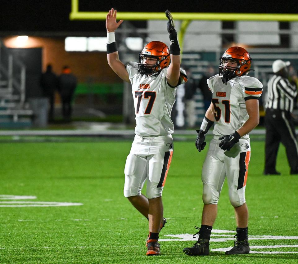 Lucas' Brayden Spitler celebrates a touchdown during the Cubs. 27-20 loss to Danville on Saturday night.