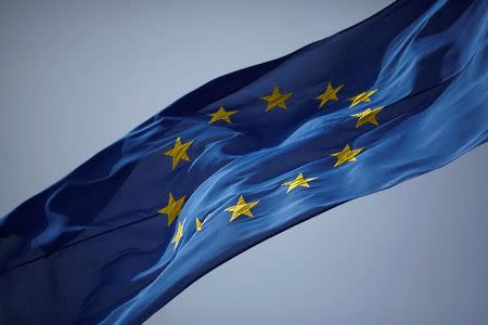 The European Union flag is seen flying, at the border of Gibraltar with Spain, in the British overseas territory of Gibraltar, historically claimed by Spain, June 27, 2016, after Britain voted to leave the European Union in the EU Brexit referendum. REUTERS/Jon Nazca