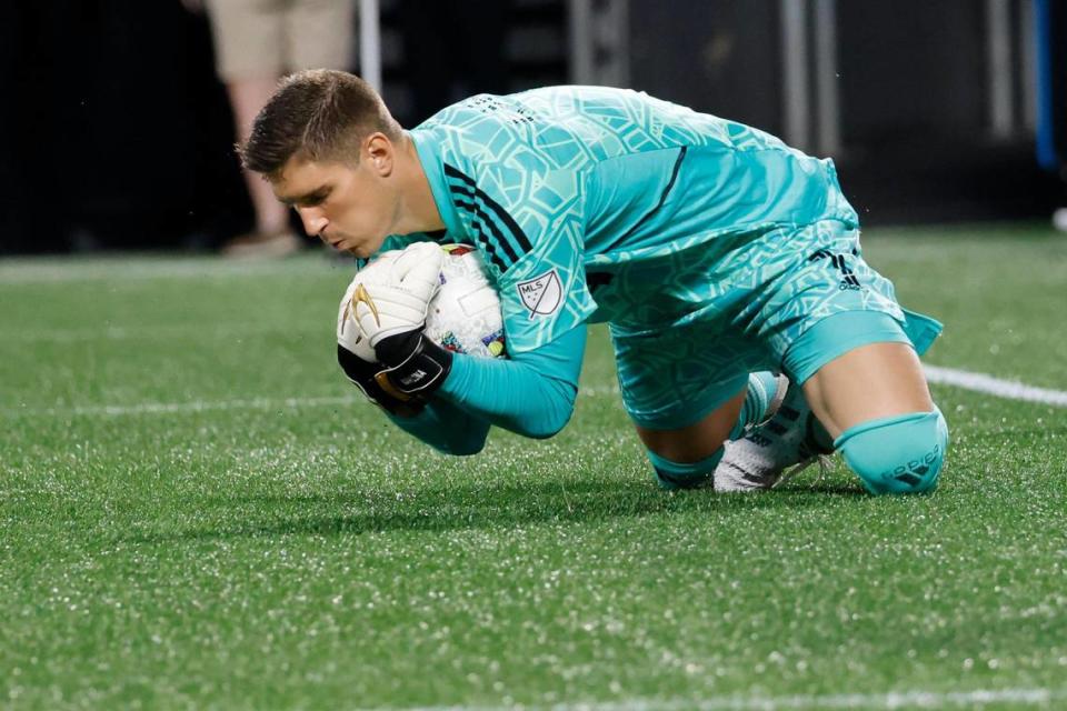 Charlotte FC goalkeeper Kristijan Kahlina (1) makes a stop against Orlando City in the second half in Charlotte, N.C., Sunday, Aug. 21, 2022.