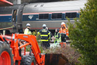 <p>Emergency responders are at the scene after an Amtrak passenger train collided with a freight train and derailed in Cayce, South Carolina, Feb. 4, 2018. (Photo: Randall Hil/Reuters) </p>