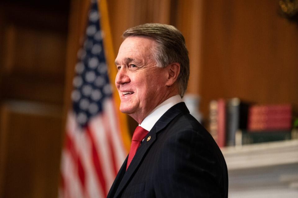 Senator David Perdue, (R-GA), meets with Seventh U.S. Circuit Court Judge Amy Coney Barrett, President Donald Trump’s nominee for the U.S. Supreme Court, before a meeting at the United States Capitol Building in Washington DC Seventh U.S. Circuit Court Judge Amy Coney Barrett, President Donald Trump’s nominee for the U.S. Supreme Court, meets with on September 30, 2020 in Washington, DC. (Photo by Anna Moneymaker-Pool/Getty Images)