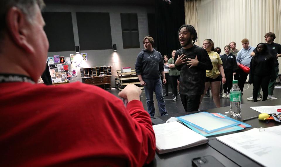 Kingston McNary, who portrays Plankton, practices a song during "The SpongeBob Musical" rehearsal at Firestone CLC in Akron Feb. 29.