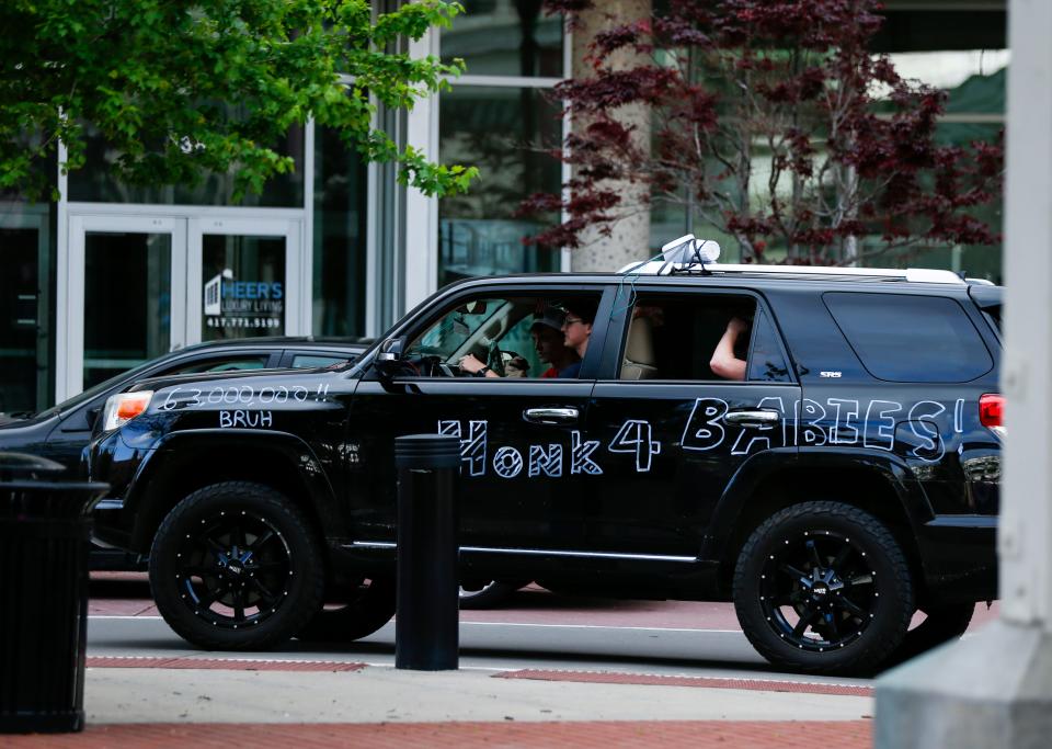 Counter protestors drive around the Park Central Square in Downtown Springfield duringÊthe Defend Roe! Emergency Rally on Friday, May 6, 2022. 