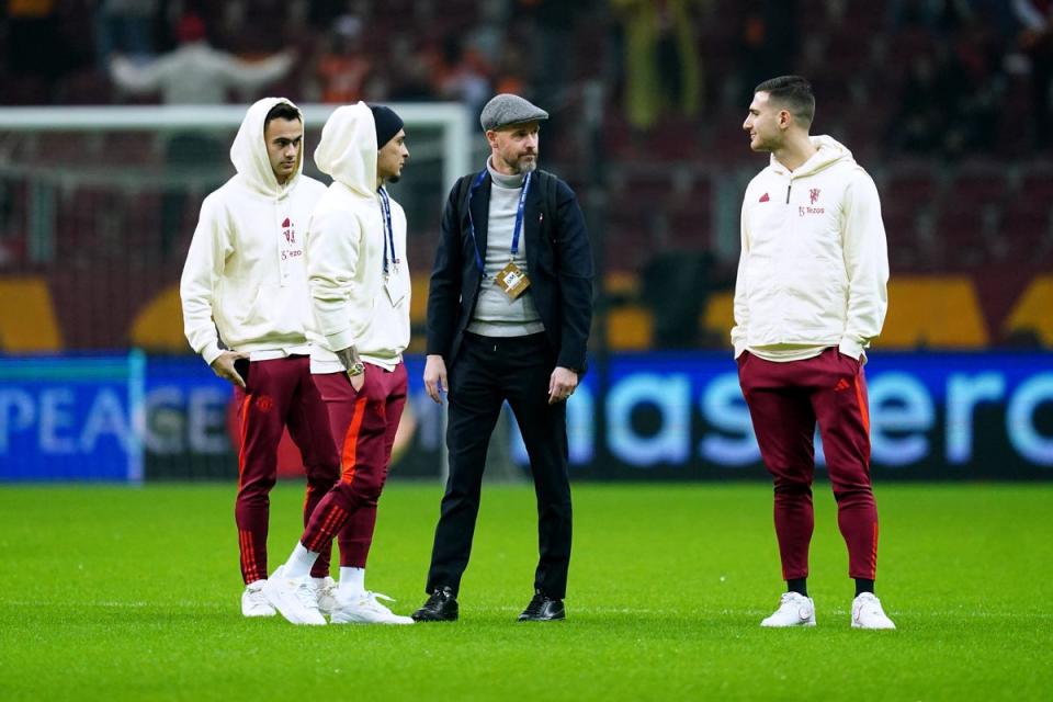 Manchester United manager Erik ten Hag and his players inspect the pitch in Istanbul (PA Wire)