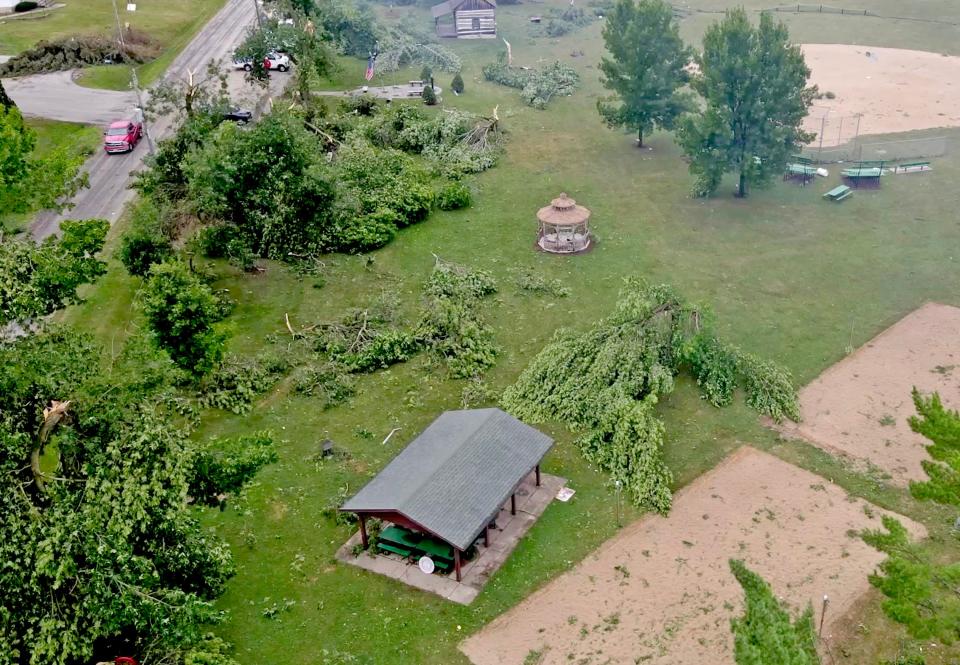 A storm that ripped through Dahnert Park in Concord, Wis., felled several trees and caused other damage.