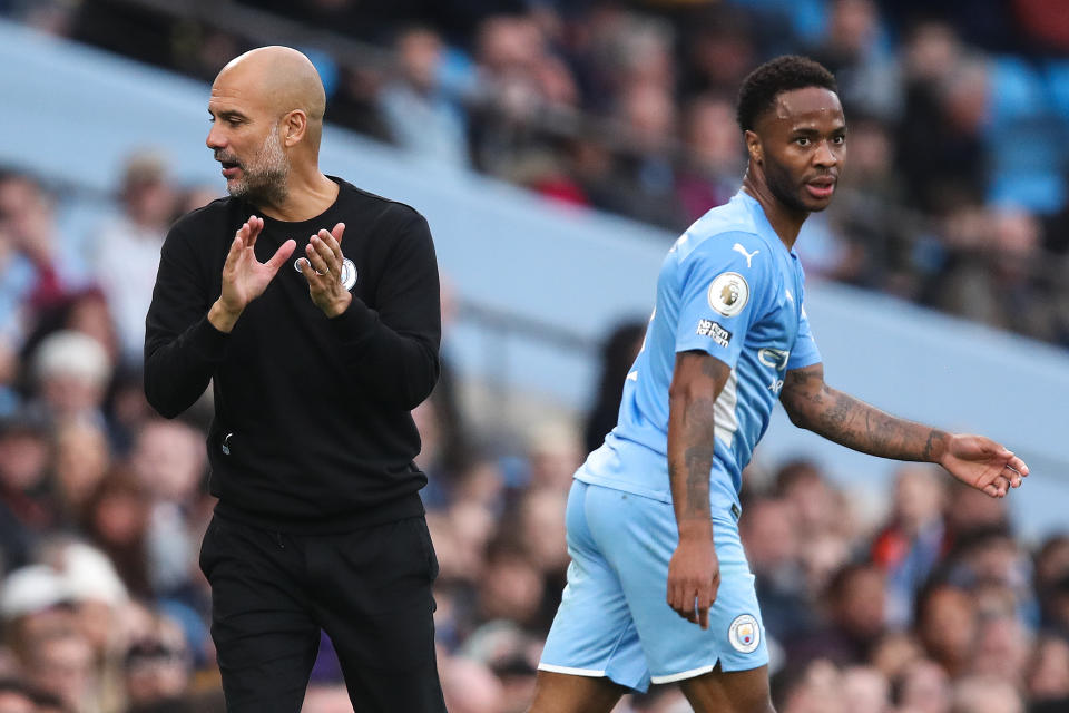 Manchester City manager Pep Guardiola (left) seemingly does not trust Raheem Sterling in key matches. 