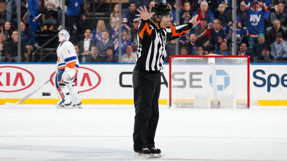 NEW YORK, NY - JANUARY 21:  Referee Wes McCauley overturns a goal by the New York Rangers in the second period for offsides against the New York Islanders at Madison Square Garden on January 21, 2020 in New York City. (Photo by Jared Silber/NHLI via Getty Images)