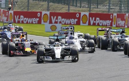 Mercedes Formula One driver Lewis Hamilton of Britain ( 44 ) leads the race at the start of the Belgian F1 Grand Prix in Spa-Francorchamps August 23, 2015. REUTERS/Yves Herman