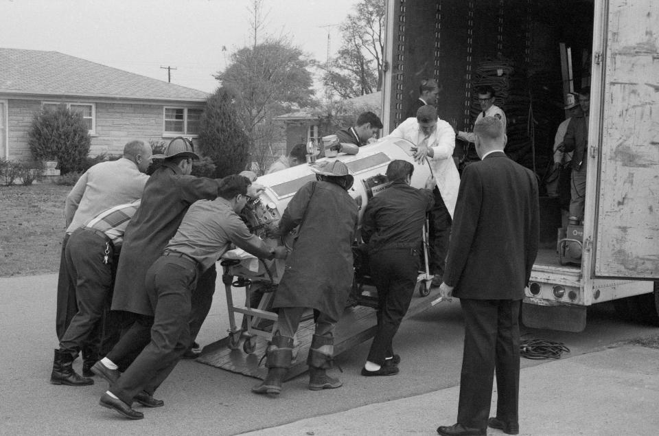 Pleasure Ridge Park firefighters and others loaded Bill Ashley, who was confined to an iron lung, into a moving van that took him to vote in the 1968 election.  By Charles Fentress Jr., The Courier-Journal. Nov. 5, 1968