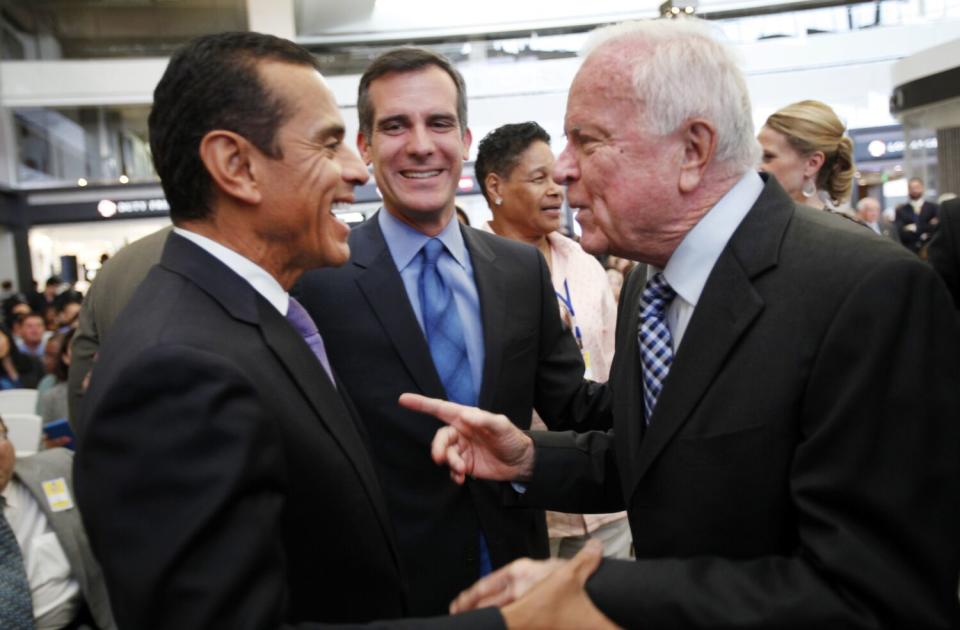 Then-L.A. Mayor Eric Garcetti, center, with former Mayors Antonio Villaraigosa, left, and Richard Riordan