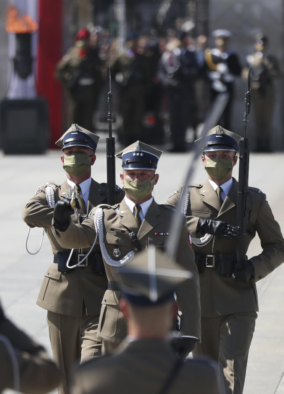 Polish soldiers at attention during ceremonies marking the centennial of the Battle of Warsaw, a Polish military victory in 2020 that stopped the Russian Bolshevik march toward the west, in Warsaw, Poland, Saturday, Aug. 15, 2020. Pompeo attended as he wrapped up a visit to central Europe.(AP Photo/Czarek Sokolowski)