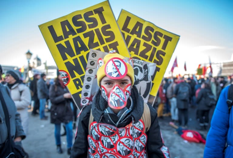 Demonstrators protested against the inauguration of the new Austrian government, which includes the far-right, in Vienna on December 18