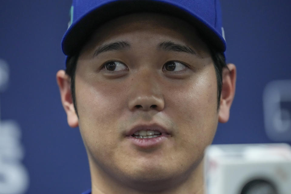 Los Angeles Dodgers' Shohei Ohtani attends a news conference ahead of a baseball workout at the Gocheok Sky Dome in Seoul, South Korea, Saturday, March 16, 2024. (AP Photo/Lee Jin-man)