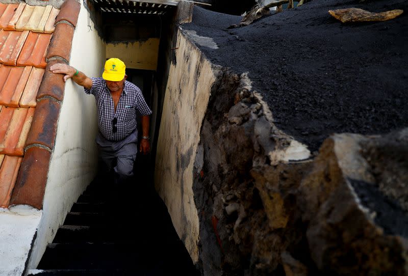 80-year-old Sabino Leal returns home for the first time since the eruption of the Cumbre Vieja volcano, in Las Manchas neighbourhood