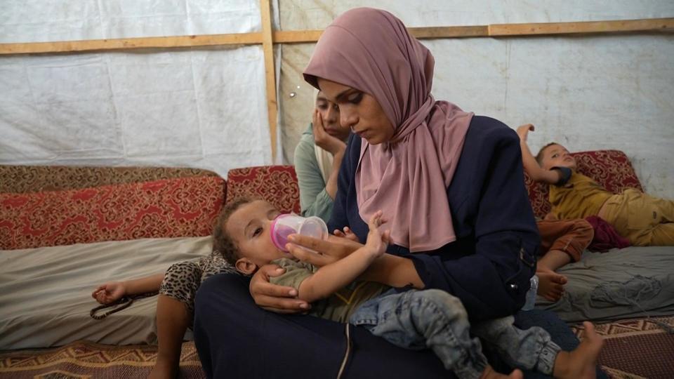 Neveen Abu Al-Jidyan is pictured with her son Abdul Rahman Abu Al-Jidyan, who the WHO said had contracted the first case of polio in Gaza in 25 years, August 28, 2024. / Credit: CBS News