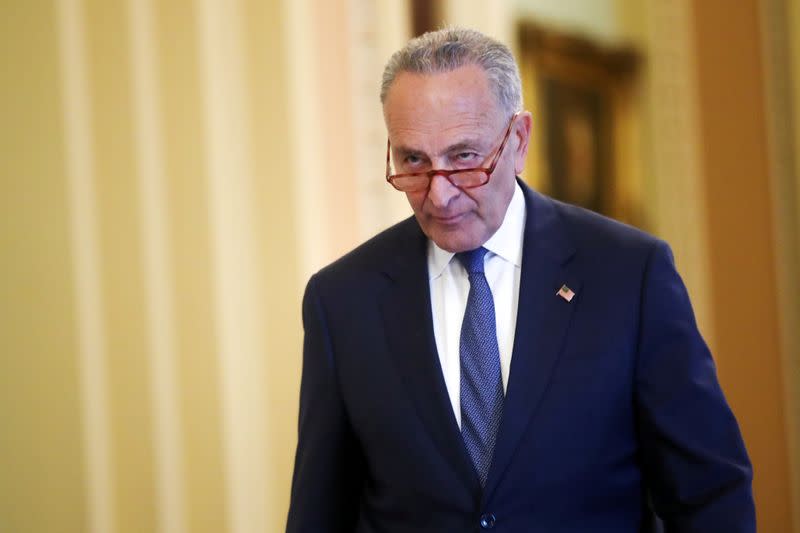 U.S. Senate Minority Leader Schumer departs the Senate floor after his remarks, in the U.S. Capitol in Washington