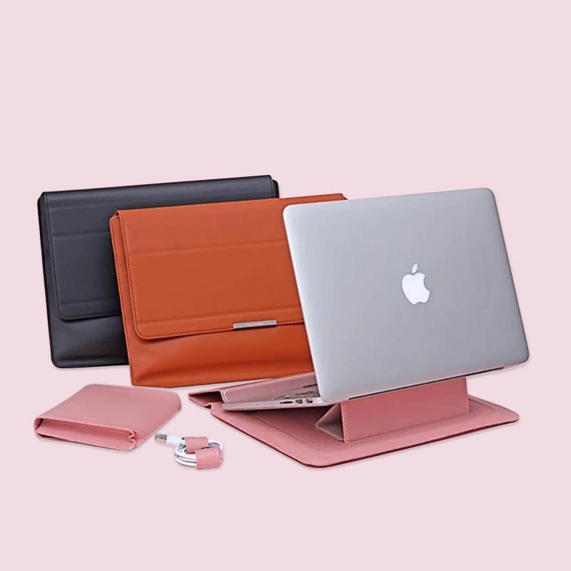 <p><strong>Multitasky</strong></p><p>multitasky.com</p><p><strong>$36.00</strong></p><p>It's a bag for your laptop! Then it's a laptop stand! Oh yea, and it's gorgeous and comes in pretty colors! If their work involves computers in any capacity, this is ~the~ gift.</p>