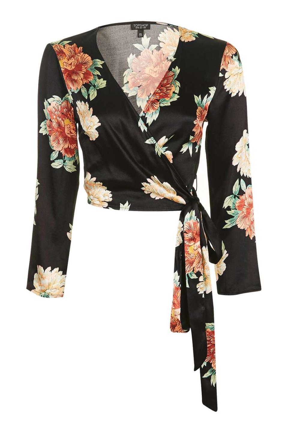 <p><i><a rel="nofollow noopener" href="http://www.topshop.com/en/tsuk/product/floral-satin-wrap-top-5940875?bi=0&ps=20&Ntt=florals" target="_blank" data-ylk="slk:Topshop, £34;elm:context_link;itc:0;sec:content-canvas" class="link ">Topshop, £34</a></i></p>