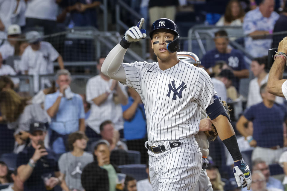 New York Yankees' Aaron Judge celebrates a home run in the third inning of a baseball game against the New York Mets, Monday, Aug. 22, 2022, in New York. (AP Photo/Corey Sipkin)