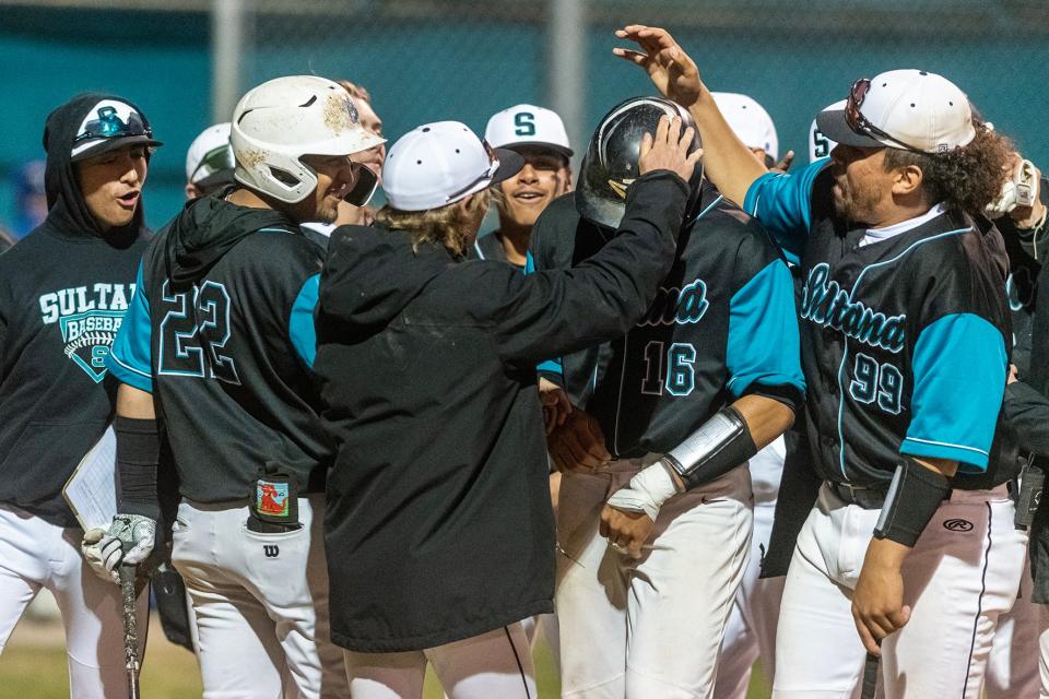 Sultana's Eric Ruiz, second from right, is congratulated by teammates after hitting a two-run home run during the fourth inning against Serrano on Tuesday April, 18, 2023. Sultana won 14-3.