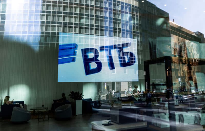 FILE PHOTO: A VTB bank logo is seen on screen through a window in the Moscow International Business Centeron a sunny day in Moscow