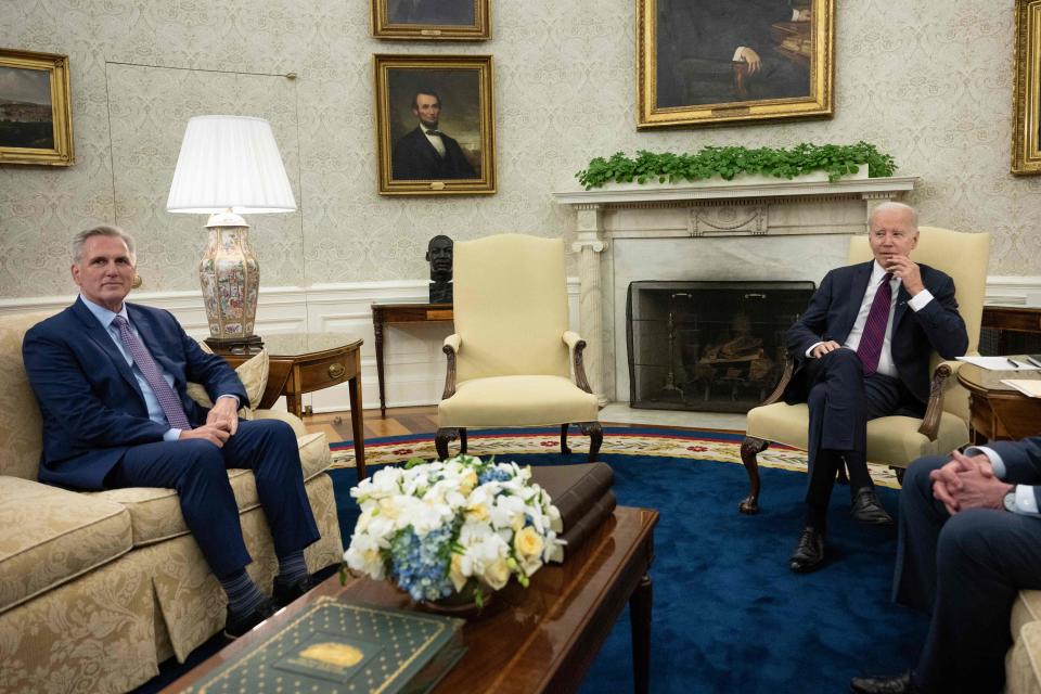 US President Joe Biden looks on during a meeting with US Speaker of the House Kevin McCarthy (R-CA) in the Oval Office of the White House in Washington, DC, on May 9, 2023. President Joe Biden will reconvene crunch debt talks on May 16, 2023, with senior Republican leaders including House Speaker Kevin McCarthy in another attempt to avert a costly US default.