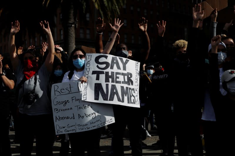 Protesters rally against the death in Minneapolis police custody of George Floyd in San Francisco