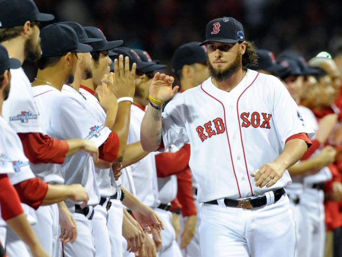 Boston Red Sox catcher Jarrod Saltalamacchia (39) is introduced prior to game one of the American League Championship Series baseball game against the Detroit Tigers at Fenway Park on Oct. 12, 2013.