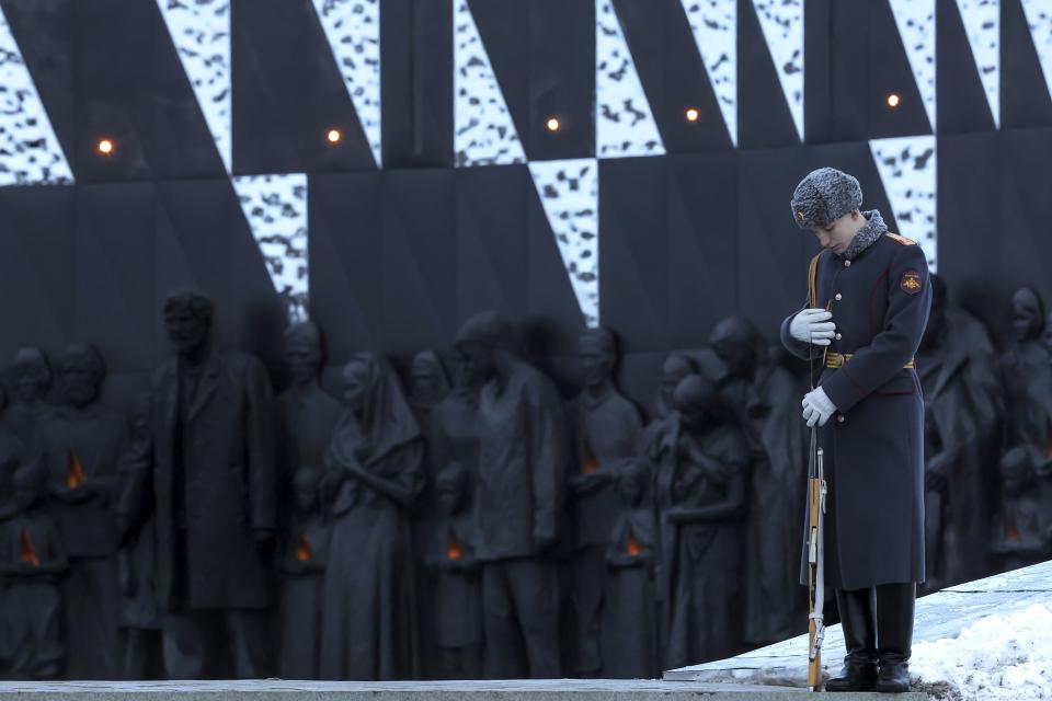 A Russian honour guard soldier stands waiting to attend the opening ceremony of the memorial complex "To the peaceful citizens of the Soviet Union who died during the Great Patriotic War", WWII, near Zaitsevo village in the Leningrad Region, Russia, Saturday, Jan. 27, 2024. The ceremony marked the 80th anniversary of the battle that lifted the Siege of Leningrad. The Nazi siege of Leningrad, now named St. Petersburg, was fully lifted by the Red Army on Jan. 27, 1944. More than 1 million people died mainly from starvation during the nearly 900-day siege. (Anton Vaganov/Pool Photo via AP)