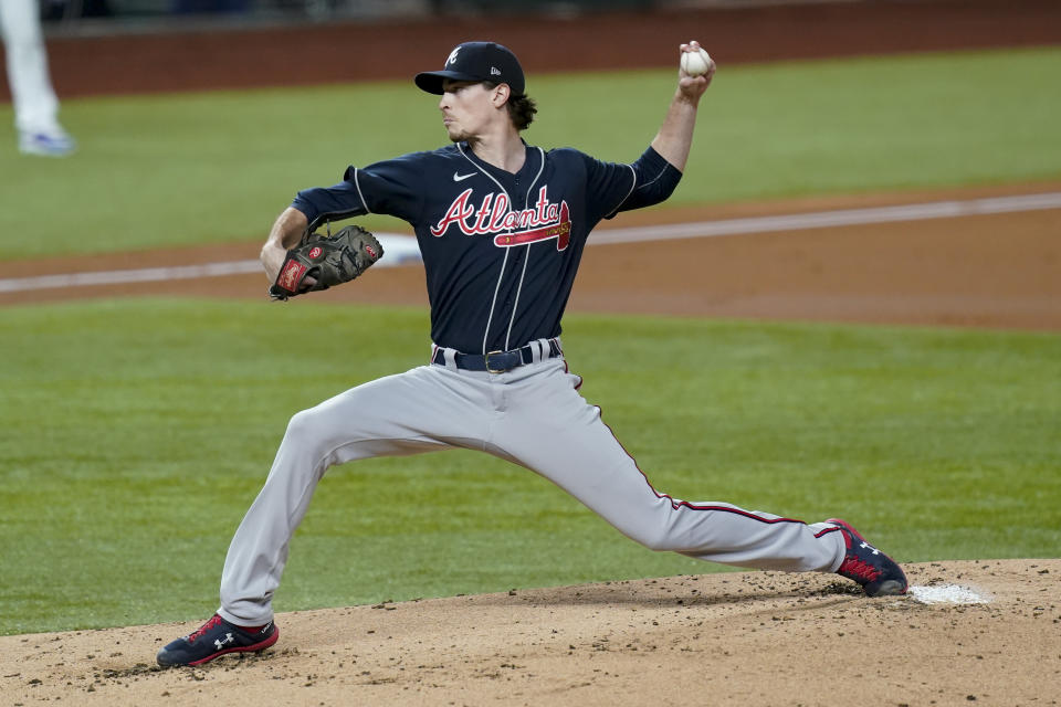 Atlanta Braves starting pitcher Max Fried throws against the Los Angeles Dodgers during the first inning in Game 1 of a baseball National League Championship Series Monday, Oct. 12, 2020, in Arlington, Texas.(AP Photo/Eric Gay)