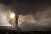 Lava from a volcano eruption flows on the island of La Palma in the Canaries, Spain, Wednesday, Sept. 22, 2021. The volcano on a small Spanish island in the Atlantic Ocean erupted on Sunday, forcing the evacuation of thousands of people. Experts say the volcanic eruption and its aftermath on a Spanish island could last for up to 84 days. The Canary Island Volcanology Institute said Wednesday it based its calculation on the length of previous eruptions on the archipelago. (AP Photo/Emilio Morenatti)